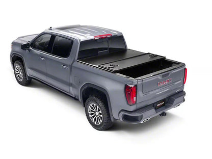 UNDERCOVER TRIAD HARD FOLDING TONNEAU COVER 2019-2024 GM 1500 SHORT BED