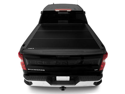 UNDERCOVER ULTRA FLEX TRI-FOLD TONNEAU COVER (BLACK TEXTURED) 2019-2024 GM 1500 SHORT BED